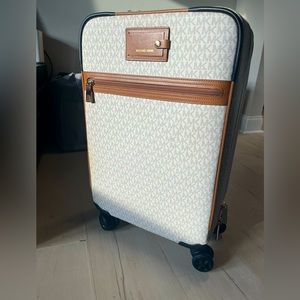 White MK carry on luggage